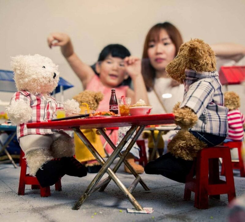 mom and kids in the teddy ville museum with discount ticket access