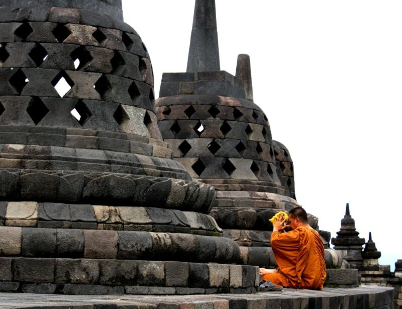 a monk at the borobudur temple complex indonesia